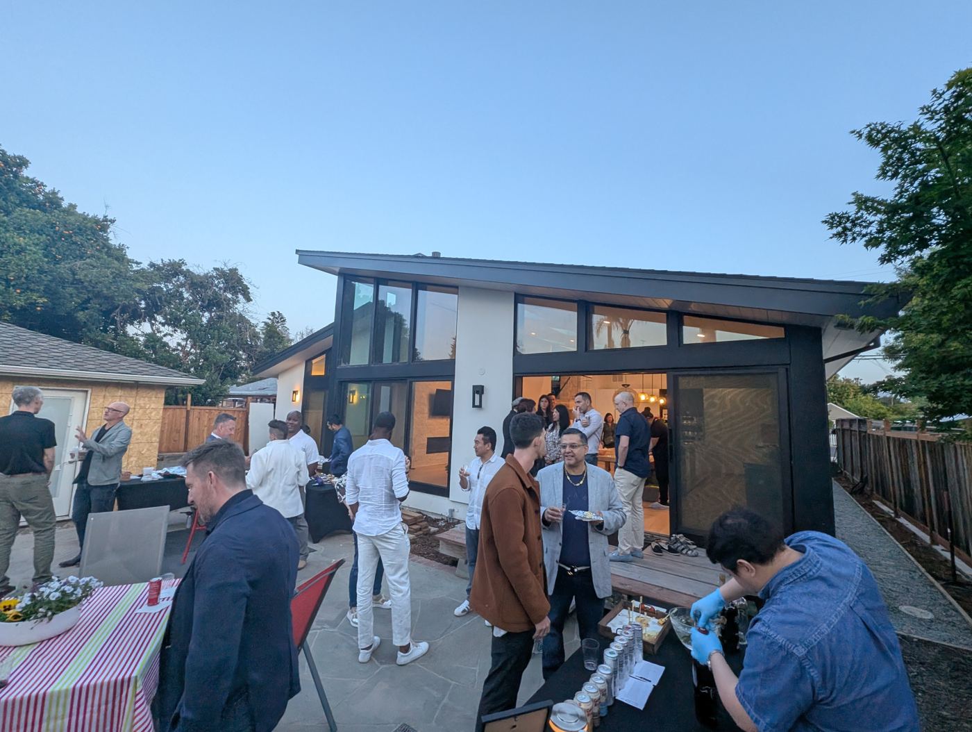 Guests gathering outside the home