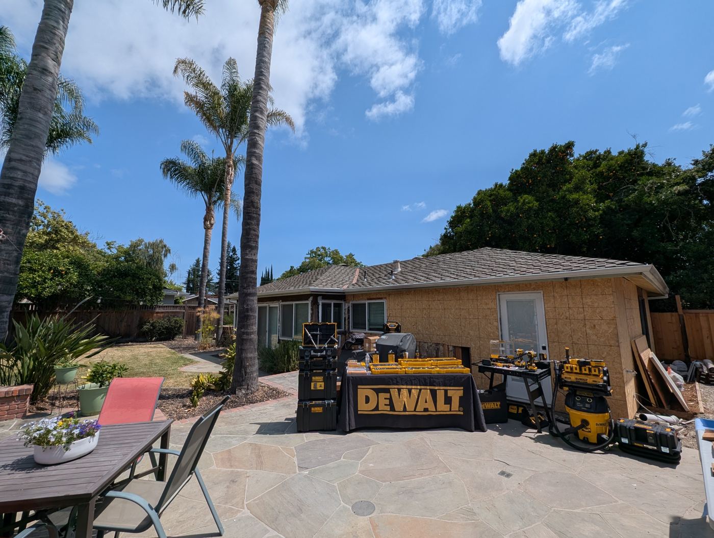 DeWalt tool demonstration tables on the stone patio